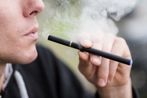 Man smoking e-cigarette